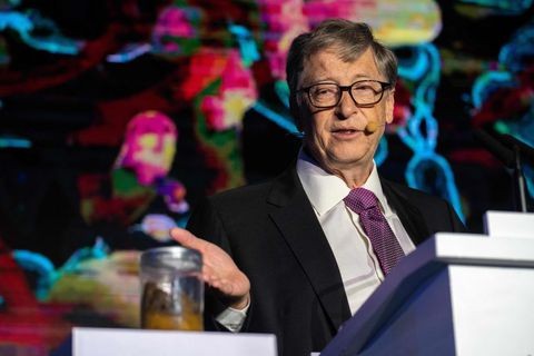 microsoft-founder-bill-gates-talks-next-to-a-container-with-news-photo-1057958504-1541539168.jpg